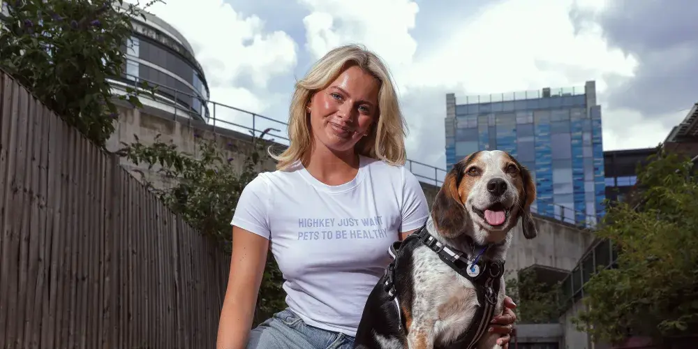 Tasha Ghouri wears her slogan tee captioned ‘Highkey just want pets to be healthy’, with Battersea dog Buster