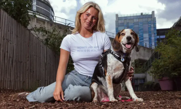 Tasha Ghouri wears her slogan tee captioned ‘Highkey just want pets to be healthy’, with Battersea dog Buster